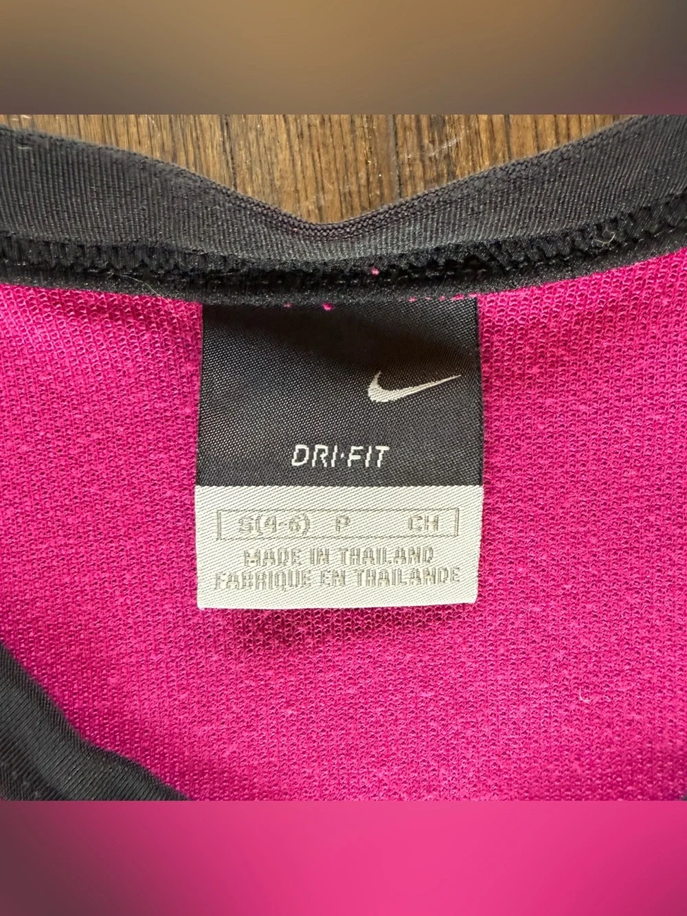 Nike women’s Pink & Black V-Neck Performance Tee size S